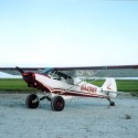super cub piper customer restoration on white and red plane